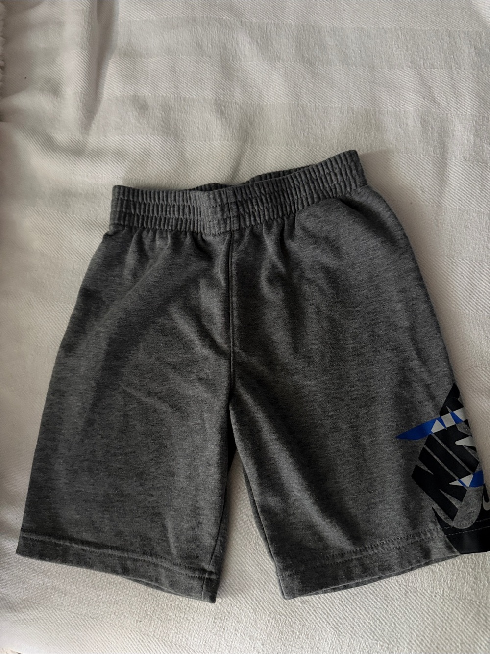 Nike Boys Charcoal Gray Athletic Shorts with Blue Accent